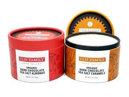 Red and kraft gift tubes for a snack brand
